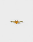 Yellow gold ring with heart-shaped orange corundum and two white diamonds