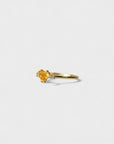 Yellow gold ring with heart-shaped orange corundum and two white diamonds