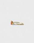 Yellow gold ring with orange heart-shaped synthetic corundum and two white diamonds