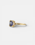 Yellow gold ring with square iolite and white diamonds