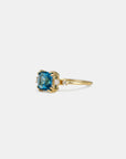 Yellow gold ring with square London topaz and white diamonds