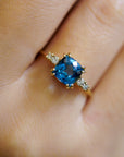 Yellow gold ring with square London topaz and white diamonds