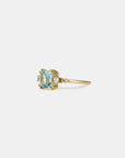 Yellow gold ring with square blue topaz and white diamonds