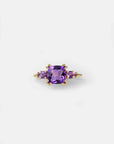 Yellow gold ring with square amethyst and side amethysts