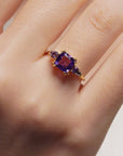 Yellow gold ring with square amethyst and side amethysts