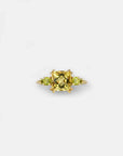 Yellow gold ring with square lemon quartz and side peridots