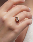Yellow gold ring with square rose quartz and side rhodolites and tourmalines