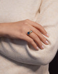 Yellow gold ring with square light blue topaz and side topaz and aquamarine