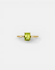 Yellow gold ring with rectangular peridot and white diamonds