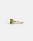 Yellow gold ring with rectangular peridot and white diamonds