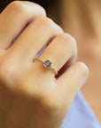 Yellow gold ring with cornflower blue sapphire ​​and white diamonds