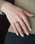 Yellow gold ring with teal tourmalines and white diamonds