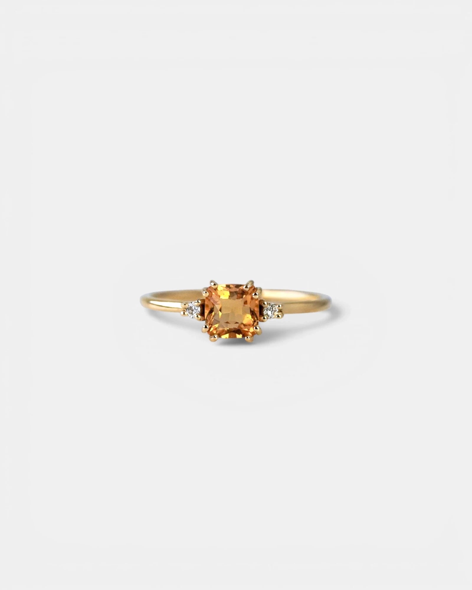 Yellow gold ring with square citrine and two white diamonds