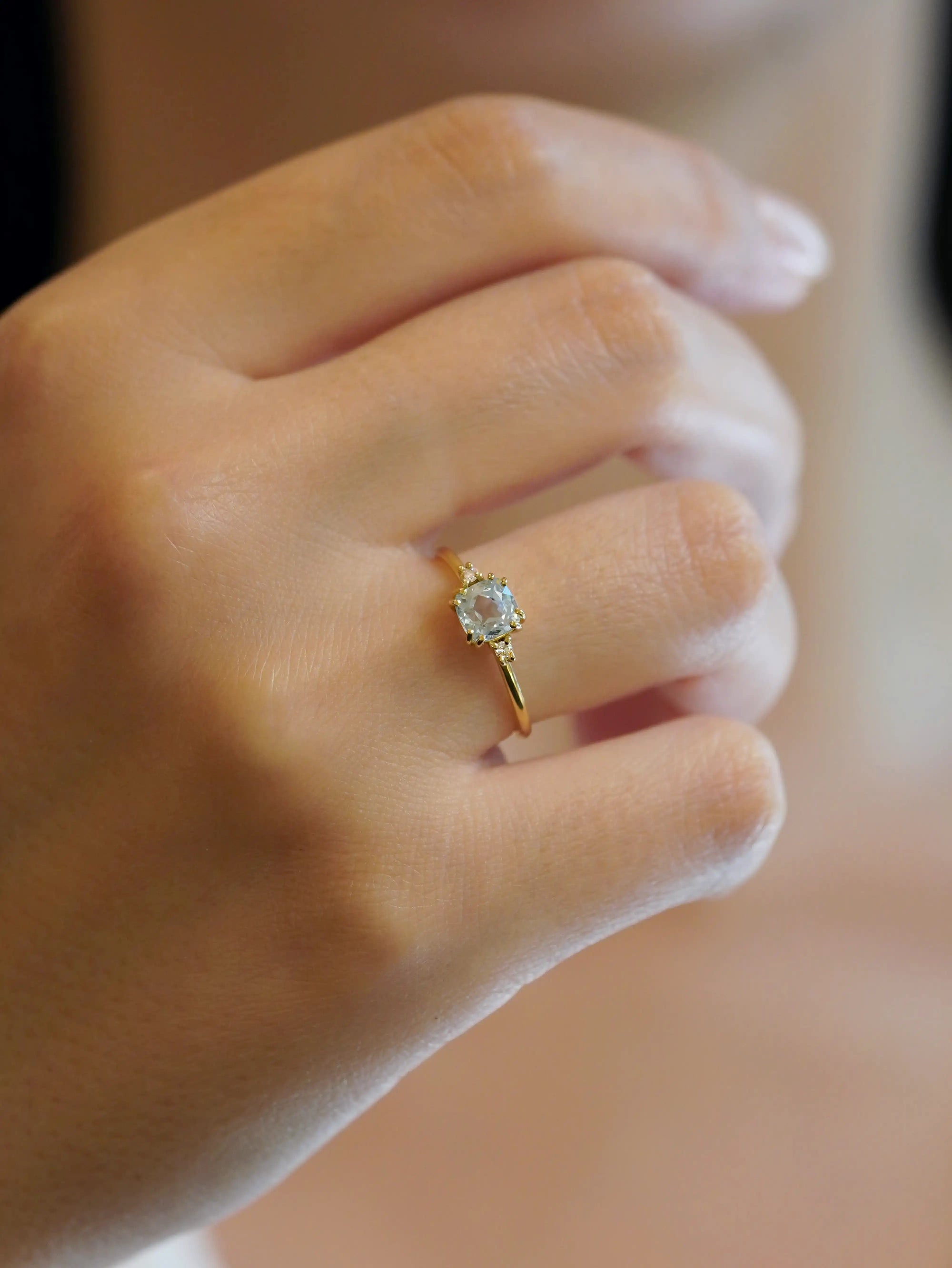 Yellow gold ring with square citrine and two white diamonds
