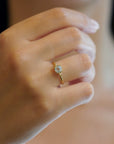 Yellow gold ring with square citrine and two white diamonds
