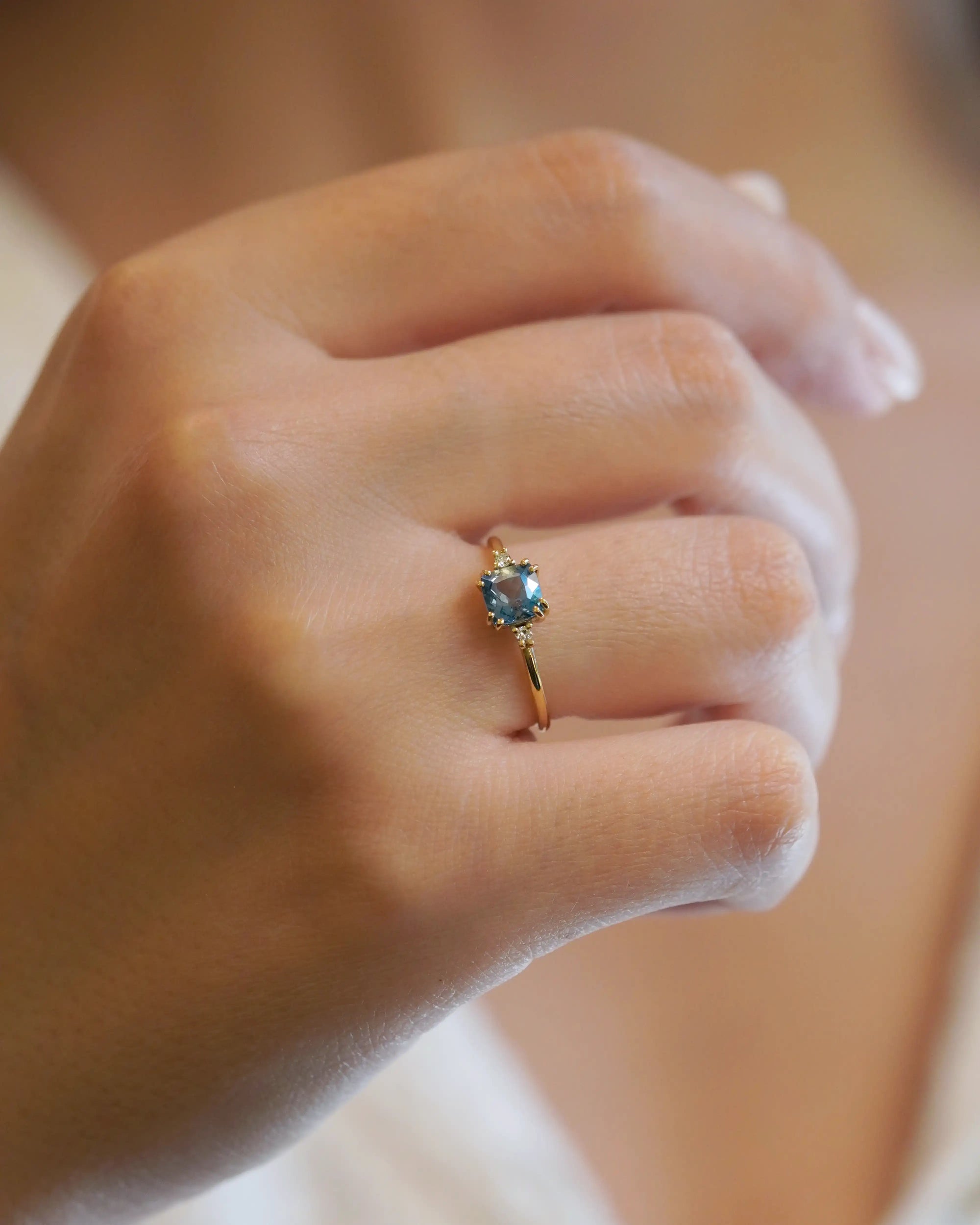 Yellow gold ring with square citrine and two white diamonds