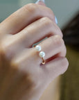 Yellow gold ring with two natural pearls