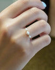 Yellow gold ring with three natural pearls and white diamonds