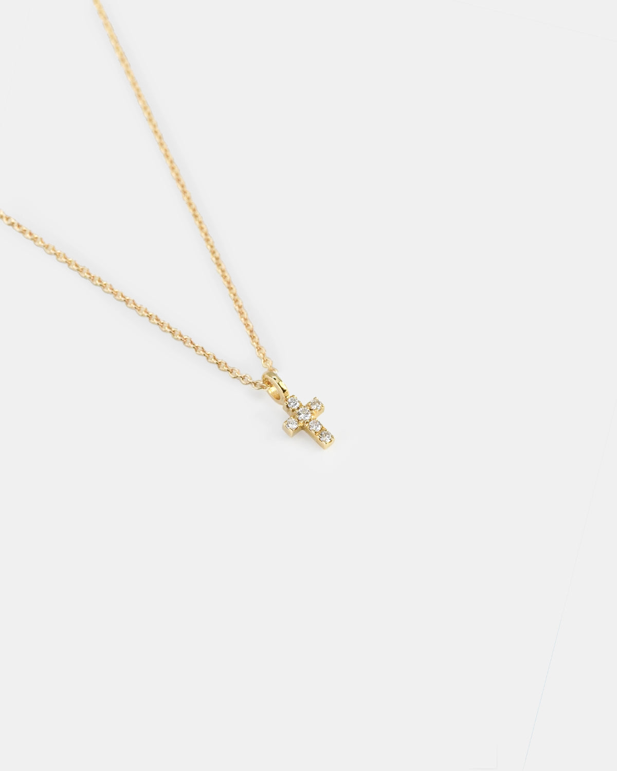 Yellow gold necklace with diamond cross