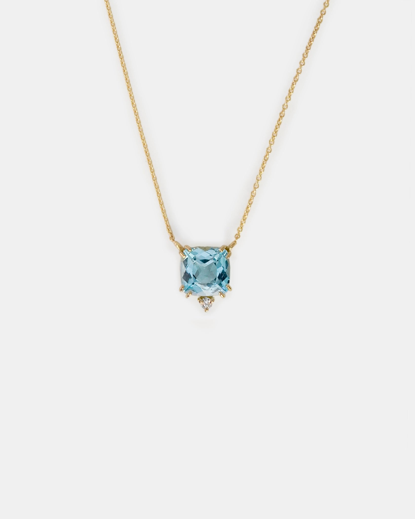 Collana in oro giallo con topazio azzurro quadrato e diamante bianco