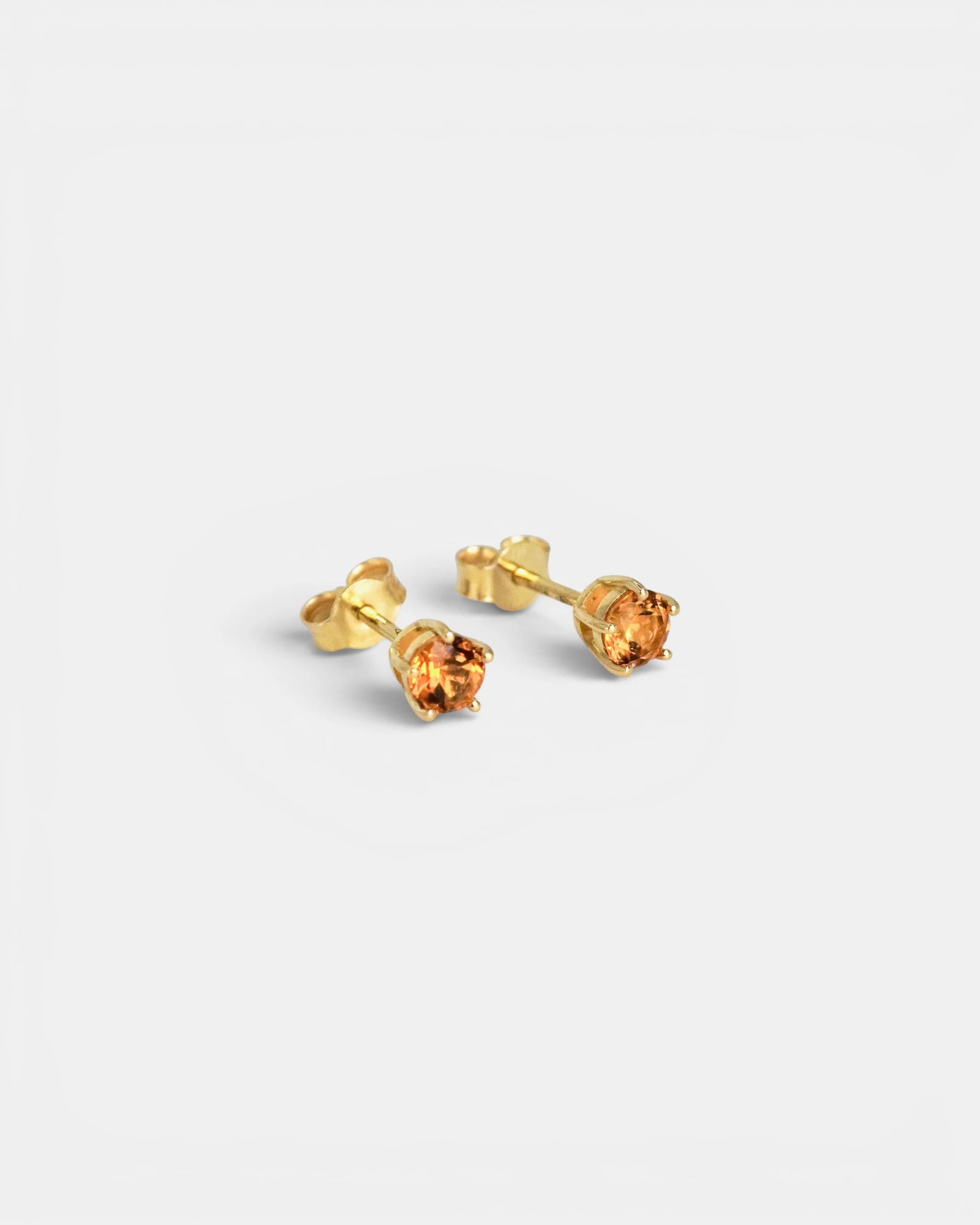 Orecchini punto luce colorati - Quarzo Madera